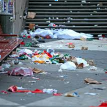 Urban street covered with litter, from Project GUTS powerpoint