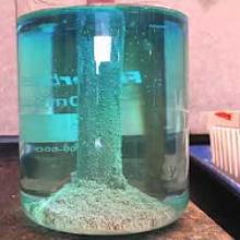 Beaker with silver nitrate solution and copper pipe